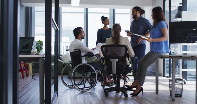 Inclusive Team Meeting in Modern Office with Disabled Employee - Download Free Stock Images Pikwizard.com