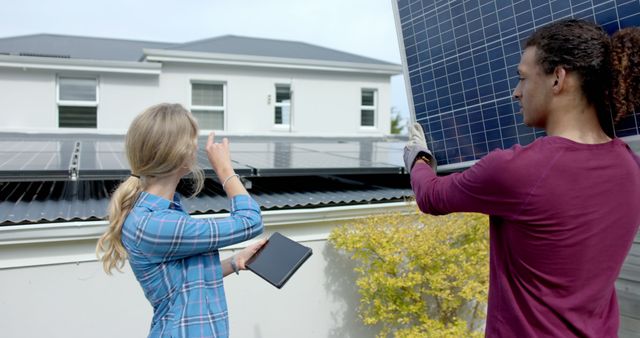 Technicians Installing Solar Panels on Residential Roof - Download Free Stock Images Pikwizard.com