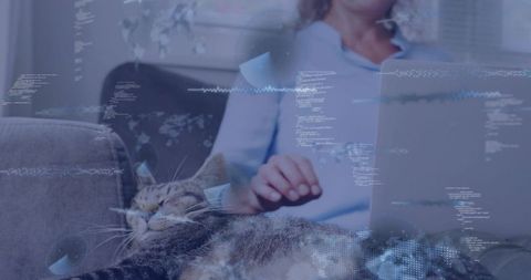 Woman typing on laptop while tabby cat sleeps on sofa remote work digital overlay