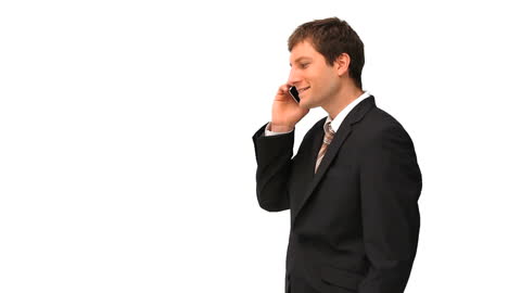 Young Businessman Taking a Phone Call in Suit