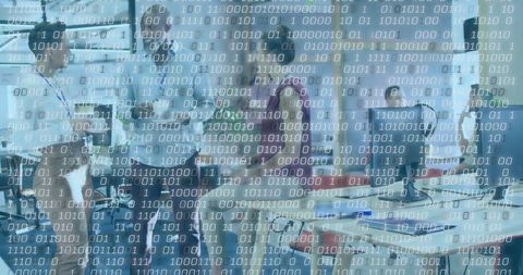 Team Discussing Digital Innovation in Modern Open-Plan Workspace