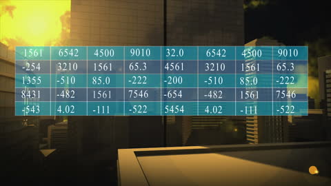 Digital Composite of Data Table Overlay on Cityscape at Sunset