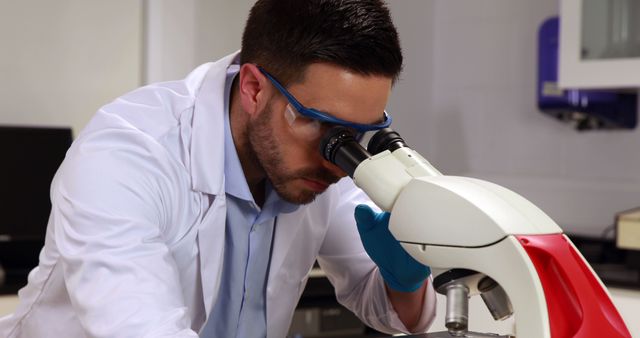 Scientist Using Microscope in Modern Laboratory - Download Free Stock Images Pikwizard.com