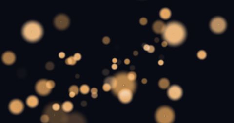 Abstract Glowing Bokeh Light Orbs on Dark Background