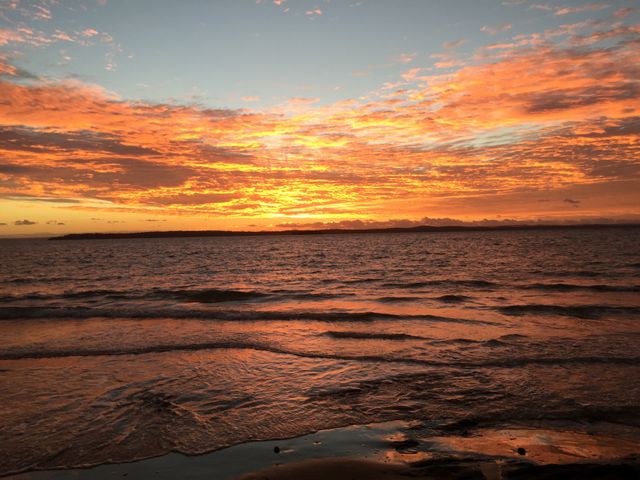 Mesmerizing Beach Sunset with Vibrant Sky - Download Free Stock Photos Pikwizard.com
