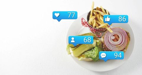 Gourmet burger and fries with social media icons
