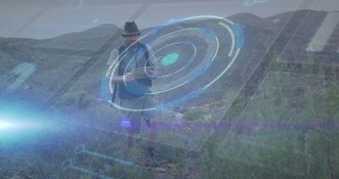 Hiker Navigating Desert Landscape with Digital Overlay Technology