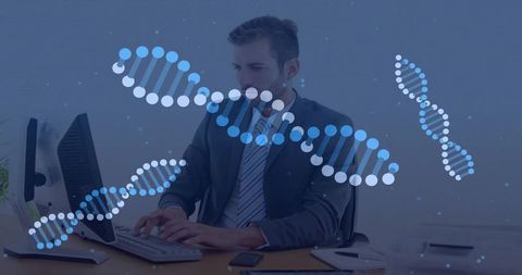 Executive working at desktop with dna strand overlay representing biotech data and genomics