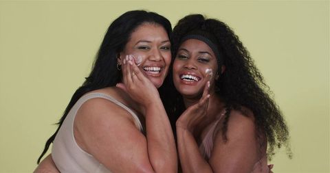 Diverse Friends Embracing Skincare Moments with Joy