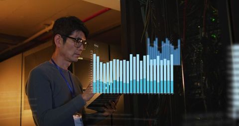 Engineer Managing Data Analytics in Server Room