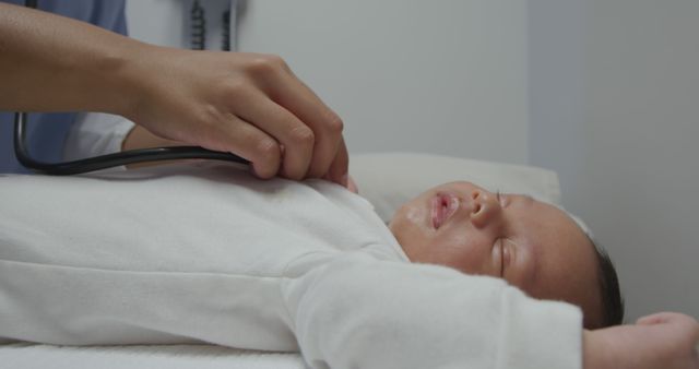 A nurse examines a newborn baby at a hospital - Download Free Stock Photos Pikwizard.com