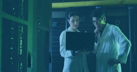 Scientists Analyzing Data in Modern Server Room Environment - Download Free Stock Images Pikwizard.com