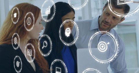 Business professionals collaborating with augmented reality overlays and data visualization