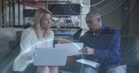 Modern Office Collaboration with Futuristic Digital Overlay