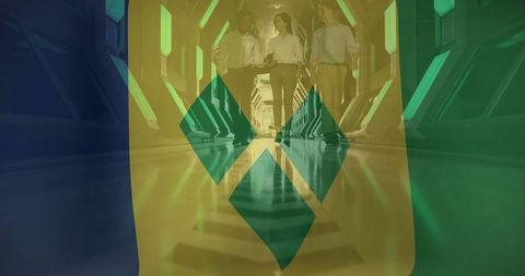 Innovative business team walking in futuristic tech corridor