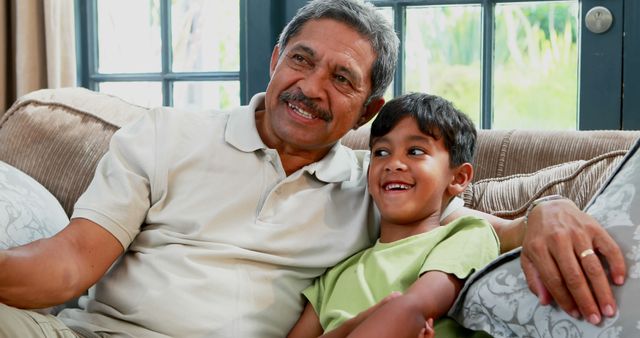 Grandfather Enjoying Quality Time with Laughing Grandson at Home - Download Free Stock Images Pikwizard.com