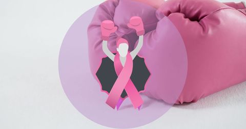 Pink Boxing Gloves Symbolizing Breast Cancer Awareness and Strength