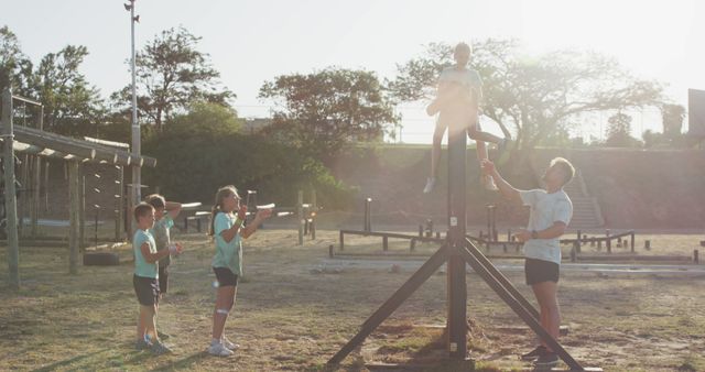 Children Playing on Outdoor Gym Equipment During Sunset - Download Free Stock Images Pikwizard.com