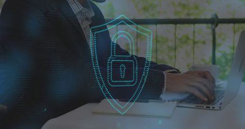 Digital Security Concept with Padlock Shield Overlaying Laptop User - Download Free Stock Images Pikwizard.com