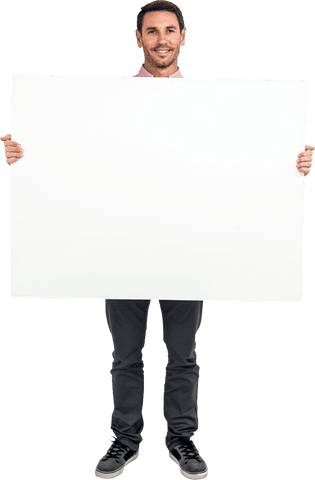 smiling man presenting transparent white sheet for display - Download Free Stock Videos Pikwizard.com