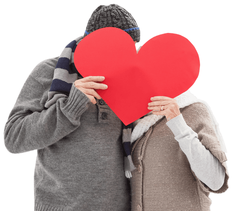 Romantic Senior Couple in Winter Clothing with Big Red Heart - Download Free Stock Videos Pikwizard.com