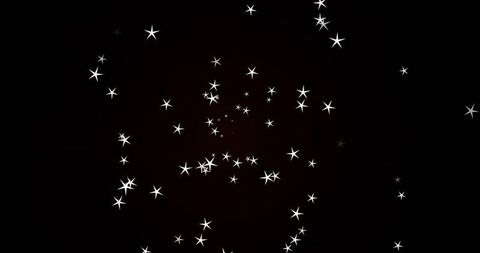 Sparkling star-like particles against dark background