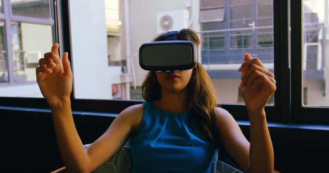 Young Woman Using Virtual Reality Headset in Modern Apartment - Download Free Stock Images Pikwizard.com