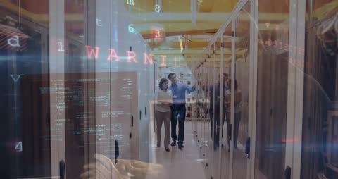 IT Engineers Analyzing Data in Server Room Overlayed with Warning Text