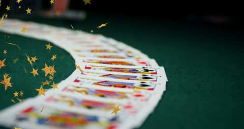Cascade of Magic Stars Over Playing Cards - Download Free Stock Images Pikwizard.com