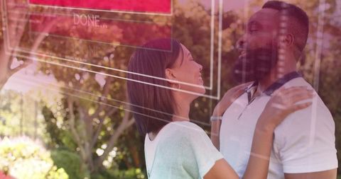 Sunlit couple embracing in garden with digital overlay, romantic lifestyle and tech concept