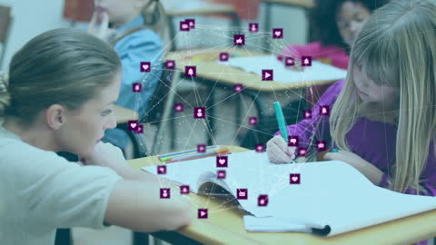 Teacher Supporting Student with Digital Connections in Classroom