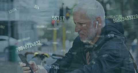Senior Man Engaging with Technology Listening to Music