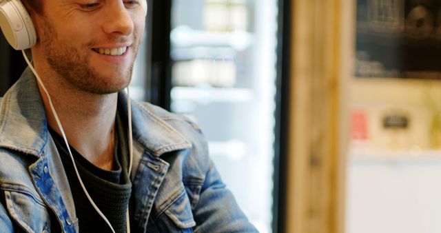 Man Listening to Music on Headphones - Download Free Stock Images Pikwizard.com