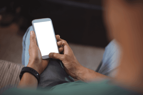 Transparent Smartphone Usage By Man in Casual Home Setting - Download Free Stock Videos Pikwizard.com