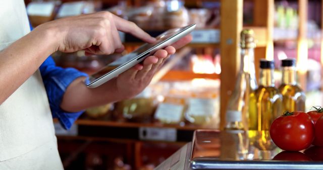 Grocery Store Clerk Using Tablet for Inventory Management - Download Free Stock Images Pikwizard.com