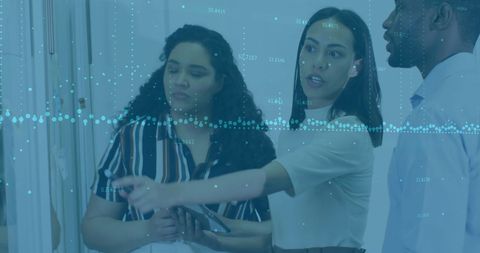 Diverse Business Professionals Analyzing Digital Financial Data with Technology