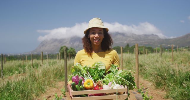 Smiling Female Farmer Holding Box of Fresh Organic Vegetables - Download Free Stock Images Pikwizard.com