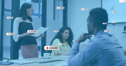 Diverse Business Meeting with Social Media Analytics Visualization