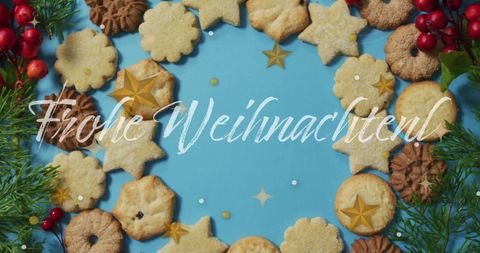 Festive Christmas Cookies Surrounding Frohe Weihnachten Greeting