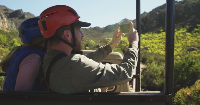 Outdoor Enthusiasts Taking Photos During Jeep Tour in Rugged Nature - Download Free Stock Images Pikwizard.com