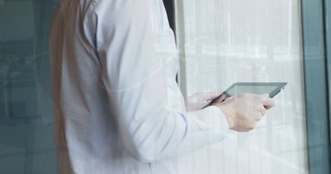 Business Professional Holding Tablet and Analyzing Data - Download Free Stock Images Pikwizard.com
