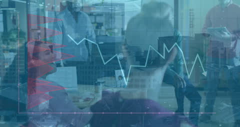 Business Team Analyzing Digital Financial Graphs in Office