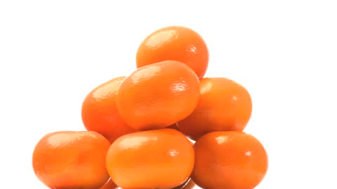 Fresh Juicy Tangerines Arranged in a Pyramid