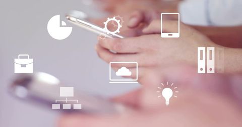 Hands tapping smartphone with business icons overlay for mobile productivity