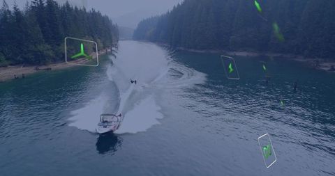 Towboat cruising forest lake with waterskier cutting wake and augmented reality eco icons