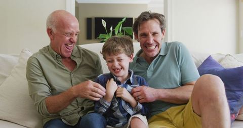 Three Generations Bonding in Living Room