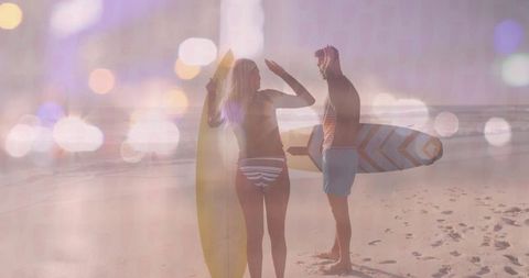 Couple Holding Surfboards on Tranquil Beach with Summer Vibes