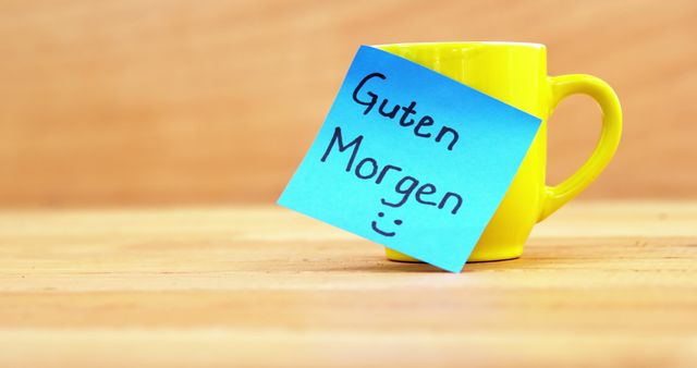 Yellow Mug with Guten Morgen Sticky Note on Wooden Table - Download Free Stock Images Pikwizard.com