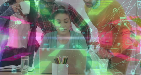 Diverse Team Analyzing Digital Network Data on Laptop