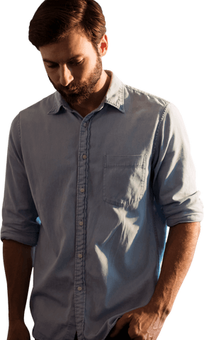 this transparent image features a young man looking thoughtful in a light blue casual shirt, perfect for concepts of introspection, contemplation, and casual fashion. useful for blogs or articles on menswear styles or mental well-being content.